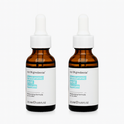 Amber glass bottle of my iN.gredients Hyaluronic Acid Serum 30ml with white dropper and turquoise label, next to its box, showcasing a 2% hyaluronic acid hydrating serum for very dry, tight, dehydrated facial skin.