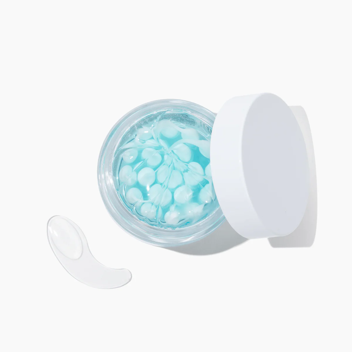Masque BAR my iN.gredients Hyaluronic Acid Capsule Cream in an open glass jar, showing its blue gel-cream and hydrating capsules, a vegan, fragrance-free moisturiser with hyaluronic acid, niacinamide and shea butter for dry, mature, dehydrated skin.