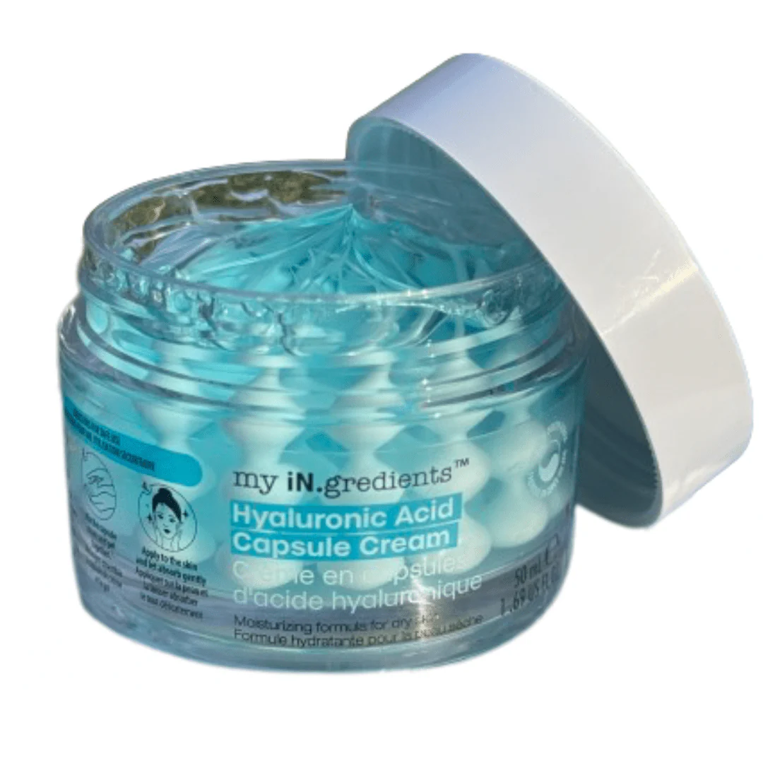 Masque BAR my iN.gredients Hyaluronic Acid Capsule Cream in an open glass jar, showing its blue gel-cream and hydrating capsules, a vegan, fragrance-free moisturiser with hyaluronic acid, niacinamide and shea butter for dry, mature, dehydrated skin.
