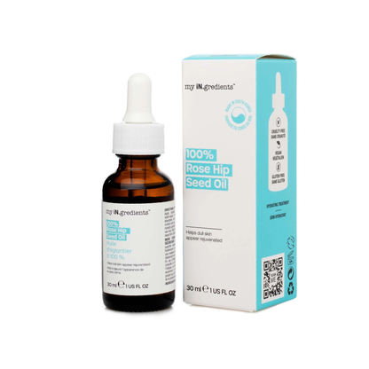 Amber glass bottle of my iN.gredients 100% Rose Hip Seed Oil 30ml with white dropper and minimal turquoise label, shown against a soft blue background, highlighting its pure, vegan formula for hydrating and soothing dull, dry, itchy facial skin.
