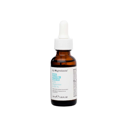 Amber glass bottle of my iN.gredients 100% Rose Hip Seed Oil 30ml with white dropper and minimal turquoise label, shown against a soft blue background, highlighting its pure, vegan formula for hydrating and soothing dull, dry, itchy facial skin.