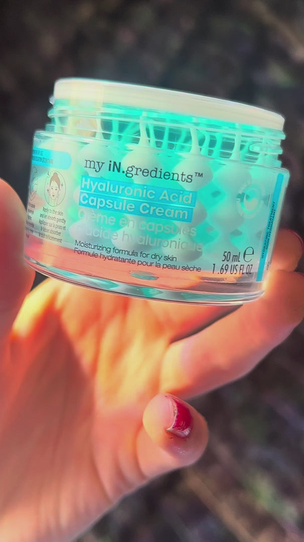 Masque BAR my iN.gredients Hyaluronic Acid Capsule Cream in an open glass jar, showing its blue gel-cream and hydrating capsules, a vegan, fragrance-free moisturiser with hyaluronic acid, niacinamide and shea butter for dry, mature, dehydrated skin.