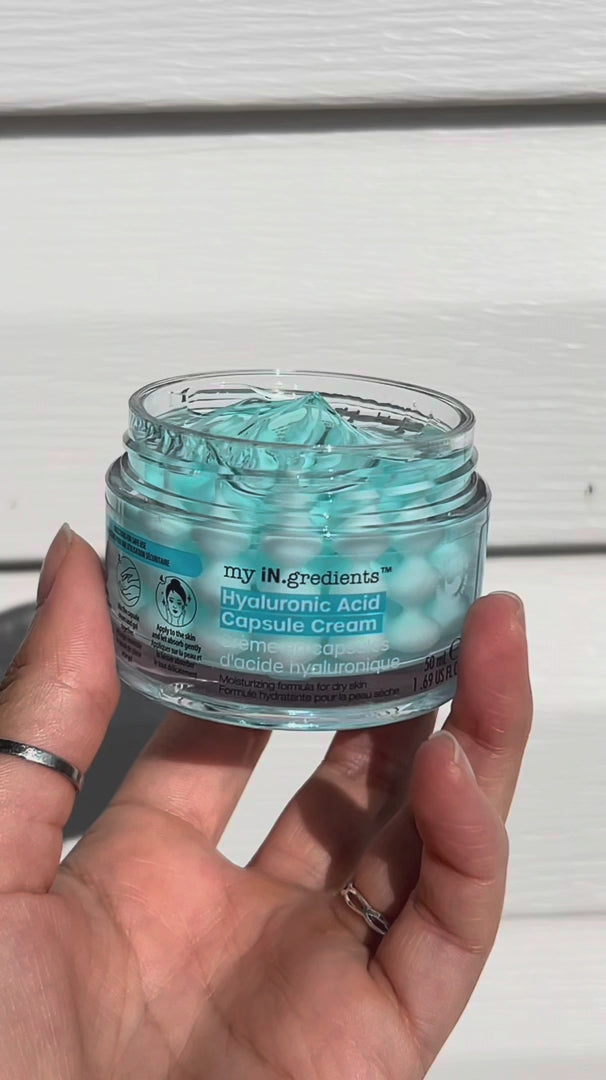 Masque BAR my iN.gredients Hyaluronic Acid Capsule Cream in an open glass jar, showing its blue gel-cream and hydrating capsules, a vegan, fragrance-free moisturiser with hyaluronic acid, niacinamide and shea butter for dry, mature, dehydrated skin.