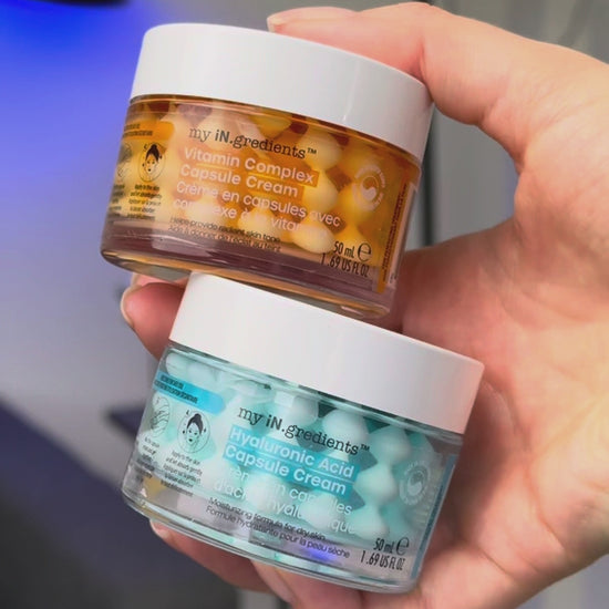 Masque BAR my iN.gredients Hyaluronic Acid Capsule Cream in an open glass jar, showing its blue gel-cream and hydrating capsules, a vegan, fragrance-free moisturiser with hyaluronic acid, niacinamide and shea butter for dry, mature, dehydrated skin.