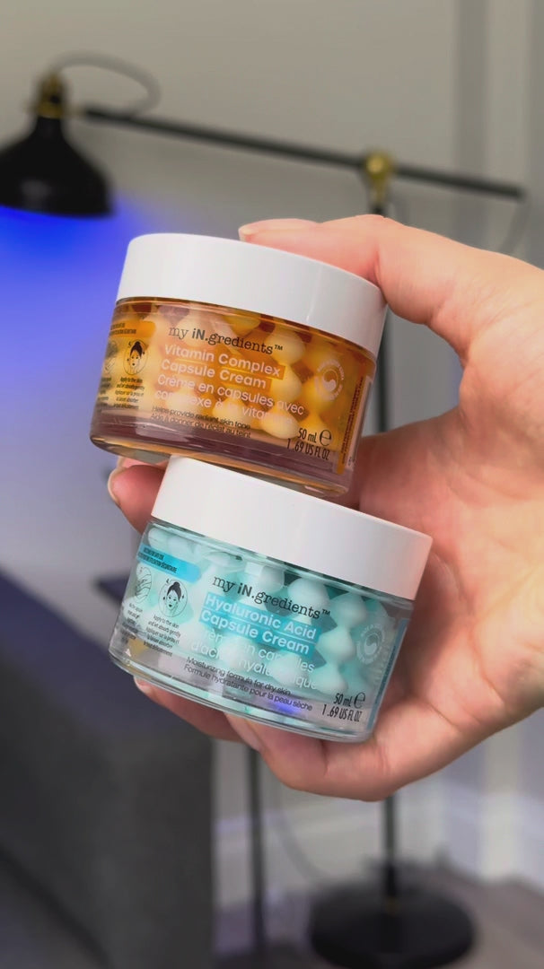 Masque BAR my iN.gredients Hyaluronic Acid Capsule Cream in an open glass jar, showing its blue gel-cream and hydrating capsules, a vegan, fragrance-free moisturiser with hyaluronic acid, niacinamide and shea butter for dry, mature, dehydrated skin.